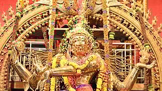 108 கிலோ மலா்கள் அபிஷேகம்...