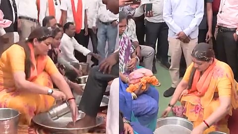 பழங்குடி மக்களின் பாதங்களைக் கழுவி இந்து மதத்திற்கு வரவேற்கும் பாஜக எம்.எல்.ஏ. பாவனா போராஹ்