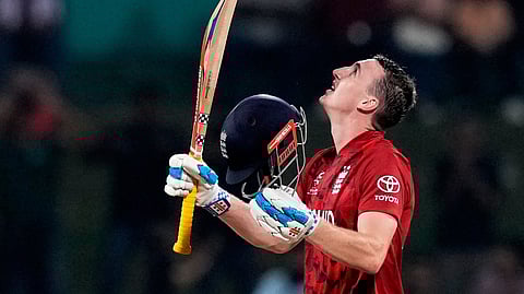 England's captain Harry Brook celebrates his century during the T20 World Cup cricket match between England and Pakistan in Pallekele, Sri Lanka, Tuesday, Feb. 24, 2026. (AP Photo/Eranga Jayawardena)