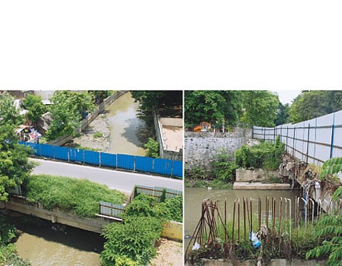 அதிகாரிகள் பனிப்போர்: பாதியில் நிற்கிறது பாலம்: மக்கள் அவதி