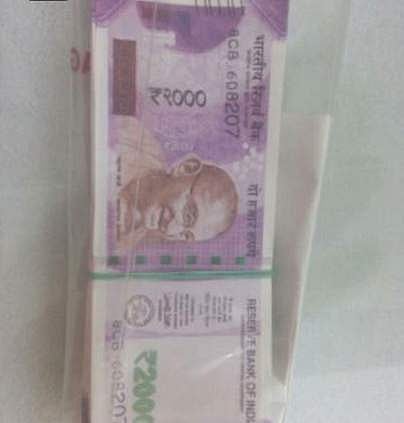 ரூ.9 லட்சம் மதிப்புள்ள போலி 2,000 ரூபாய் நோட்டுகள் பறிமுதல்