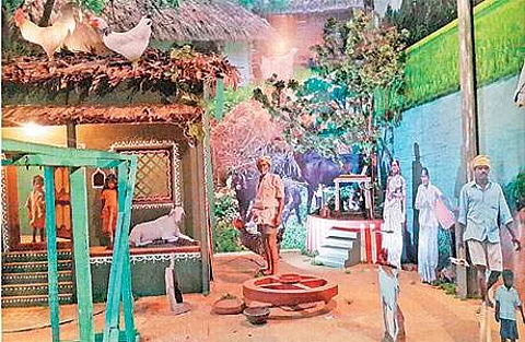 சென்னை தீவுத்திடலில் சுற்றுலாத் துறை அரங்கில் இடம்பெற்றுள்ள 'நிழல் கிராமம்'.
