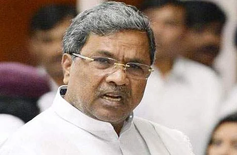 எல்லாவற்றுக்கும் காரணமான நரேந்திர மோடிக்கு ஓட்டு: காங்கிரஸ் வேட்பாளரை அதிர வைத்த சித்தராமையா
