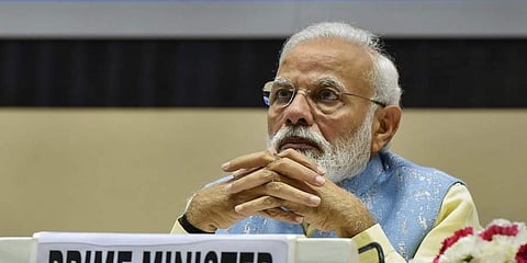 மோடியைக் கொல்ல எனக்கு ஒப்பந்தம் அளியுங்கள்: முகநூல் பதிவிட்டவர் கைது