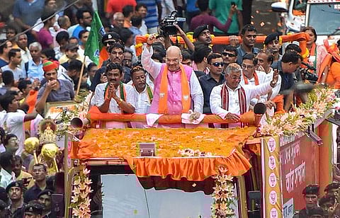 பாஜக தேசியத் தலைவர் அமித் ஷா கொல்கத்தாவில் செவ்வாய்க்கிழமை கலந்து கொண்ட பேரணி.