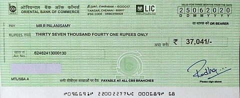எல்.ஐ.சி. யில் இருந்து அனுப்பியதாக கட்செவி அஞ்சல் மூலம் பகிரப்பட்ட காசோலை. (உள்படம்) பழனிச்சாமி.