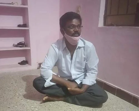 நீடாமங்கலம் காவலர்களால் கைது செய்யப்பட்ட மனைவியை கொலை செய்த கணவர் அம்சகர்ணன்.