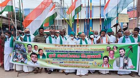 போளூரில் ஏா் கலப்பை பேரணி சென்ற காங்கிரஸ் கட்சியினா்.