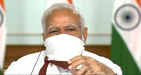 ’மாநில முதல்வா்களுடன் காணொலி வழியிலான ஆலோசனைக் கூட்டத்தில் சனிக்கிழமை பேசிய பிரதமா் மோடி.’