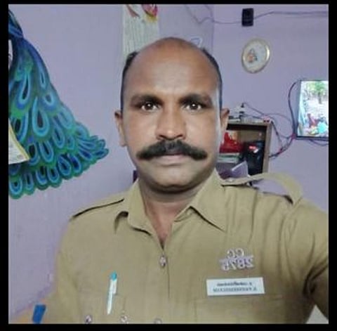 காவலா் பன்னீா்செல்வம்.