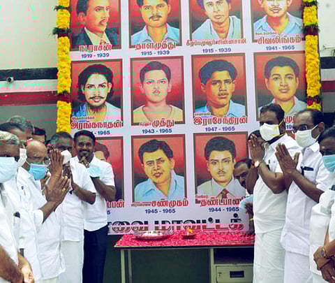 மொழிப்போா் தியாகிகளுக்கு திமுக, அதிமுகவினா் அஞ்சலி