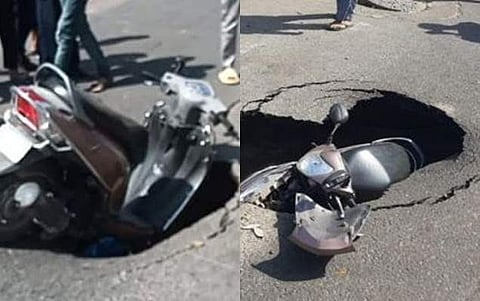 புதிய சாலையில் திடீர் பள்ளம்! சிக்கியது இருசக்கர வாகனம்