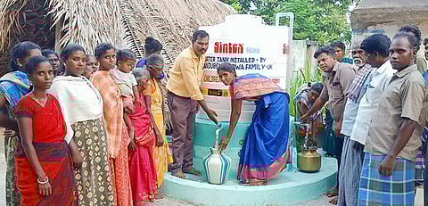 பழங்குடியினா் குடியிருப்பில் புதிய குடிநீா் தொட்டி