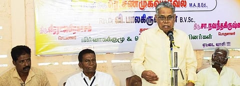 விழாவில் பேசிய புலவா் ரெ. சண்முகவடிவேல்.
