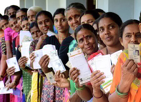 10/05/2023 ? MYSURU: Women voters queue up at a polling booth to caste their vote for assembly election in Mysuru - Express Photo by Udayshankar S.