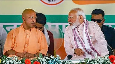 பிரதமா் நரேந்திர மோடி, முதல்வா் யோகி ஆதித்யநாத்.