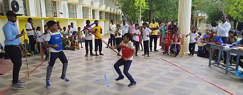 எஸ். எஸ். துரைச்சாமி நாடாா் மாரியம்மாள் கல்லூரி வளாகத்தில் நடைபெற்ற சிலம்பம் போட்டி