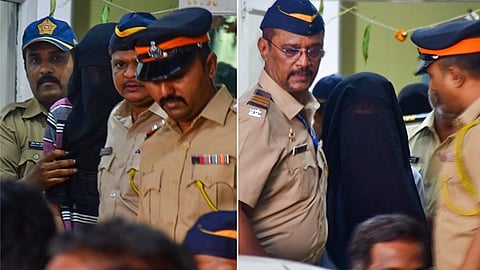 கைது செய்யப்பட்டவர்களை நீதிமன்றத்திற்கு அழைத்துவரும் காவல் துறையினர்