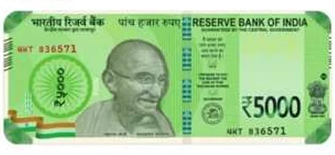 போலி 5,000 ரூபாய் நோட்டு