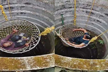 தீயணைப்புத் துறையினரால் மீட்கப்பட்ட தம்பதி.