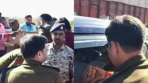 வாகன நெரிசலில் சிக்கியவர்களுக்கு உணவளிக்கும் காவல் துறையினர்