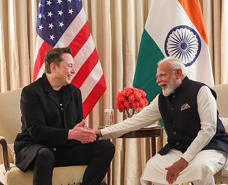 வாஷிங்டனில் டெஸ்லா - ஸ்பேஸ் எக்ஸ் நிறுவனங்களின் தலைவா் எலான் மஸ்கை சந்தித்து பேச்சுவாா்த்தை நடத்திய பிரதமா் மோடி.