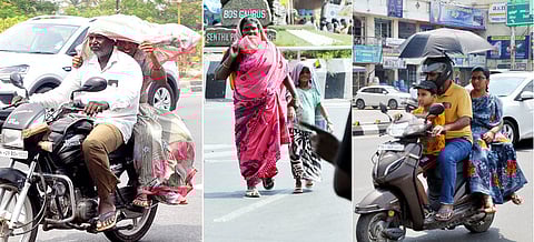 சேலத்தில் செவ்வாய்க்கிழமை வீசிய கடும் வெயிலால் சாலையில் சிரமத்துடன் சென்ற பொதுமக்கள்.