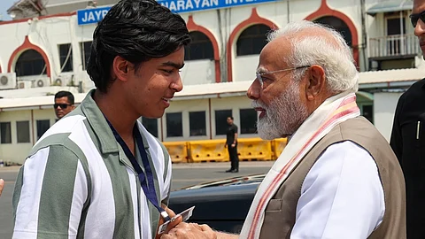 Vaibhav Suryavanshi with PM Modi. (pics from Modi, X)