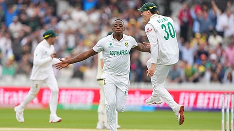 South Africa's Kagiso Rabada, center, celebrates the dismissal of Australia's Cameron Green during the World Test Championship final 