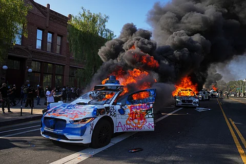 Waymo taxis burn in Los Angeles