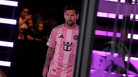 Inter Miami's Lionel Messi walks onto the field for the Club World Cup group A soccer match between Inter Miami and FC Porto in Atlanta