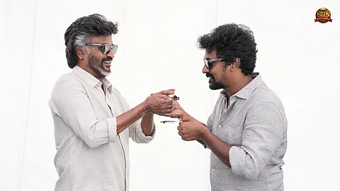 Rajinikanth feeds cake to Nelson on his Birthday