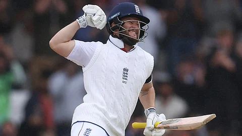 England's Ben Duckett celebrates after scoring a century on day five of the first cricket test match between England and India at Headingley in Leeds