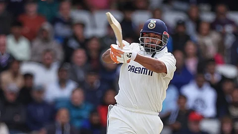 India's Rishabh Pant plays a shot on day four of the first cricket test match between England and India at Headingley in Leeds, England,