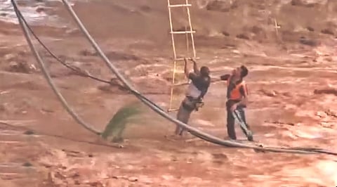 Nine men trapped
