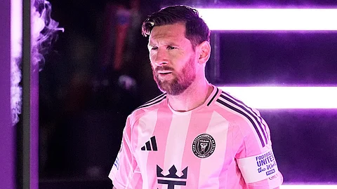 Inter Miami's Lionel Messi enters the field before the Club World Cup round of 16 soccer match between PSG and Inter Miami
