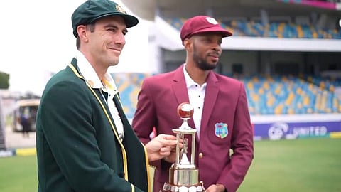 The captains of the Australia and West Indies teams with the Frank Worrall Trophy.