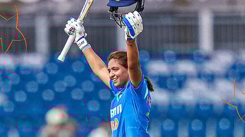 Harmanpreet Kaur celebrates after scoring a century.