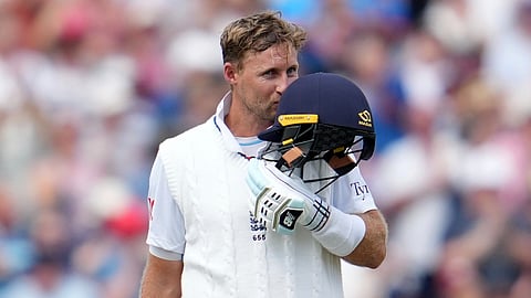 joe root celebrates after scoring century