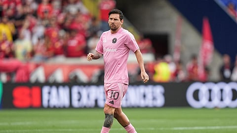 Inter Miami's Lionel Messi warms up with teammates before an MLS soccer match