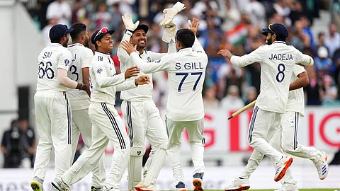 Indian team players celebrate after defeating England