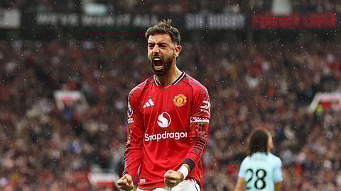 Bruno Fernandes celebrates after scoring a penalty...
