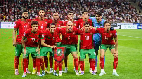 Morocco's starting 11 poses for a photo ahead of their World Cup group E qualifying soccer match against Niger at Stade Prince Moulay Abdallah in Rabat, Morocco, 
