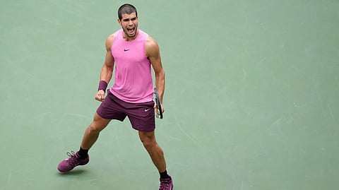 Carlos Alcaraz, of Spain, celebrates after defeating Novak Djokovic, of Serbia, during the men's singles semifinals of the U.S. Open tennis championships,