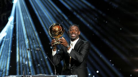 Paris Saint-Germain's Ousmane Dembélé receives the 2025 Men's Ballon d'Or during the 69th Ballon d'Or awards ceremony.