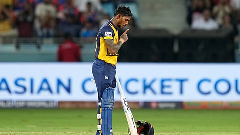 Sri Lanka's Pathum Nissanka gestures as he celebrates his century during the Asia Cup cricket match.