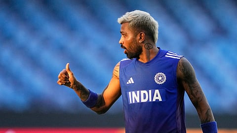 India's Hardik Pandya warms up before the Asia Cup cricket match between India and Sri Lanka a