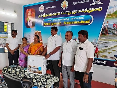 நூலகத்துக்கு பிரிண்டா் வழங்கல்