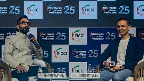 Ishan Chatterjee with Dinesh Karthik.