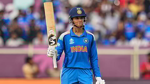 Smriti Mandhana celebrates after scoring a half-century